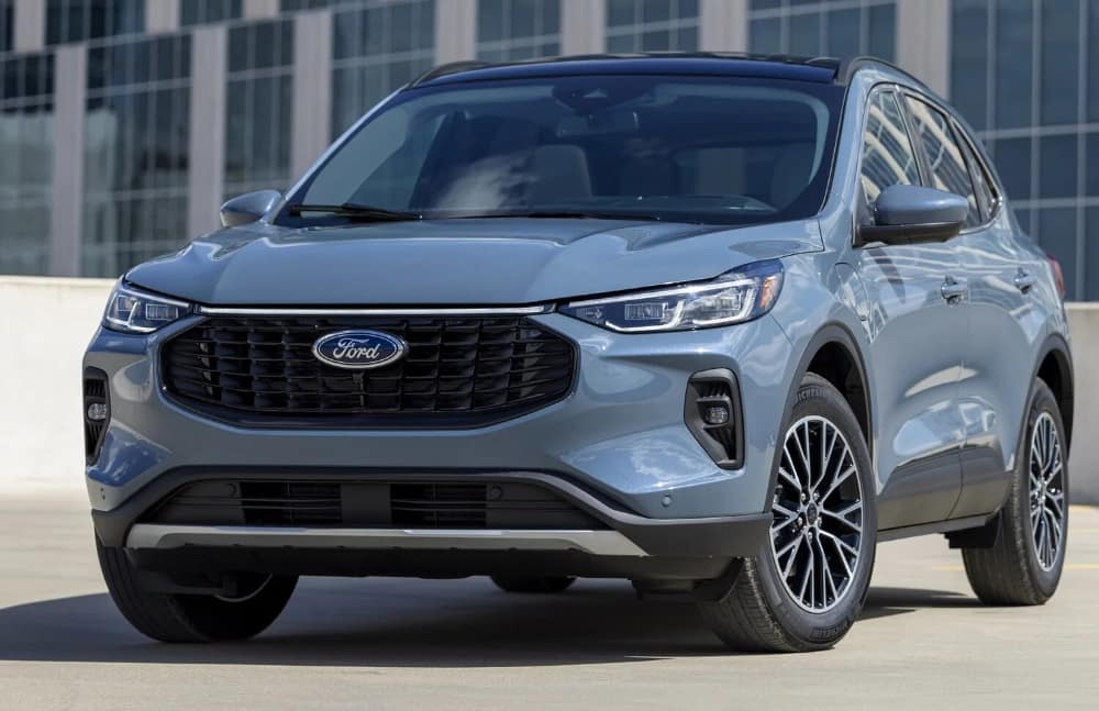 The new Ford Escape sits parked in a lot, showcasing it's eye-catching style and making this SUV a great pick from Cleveland Ford.