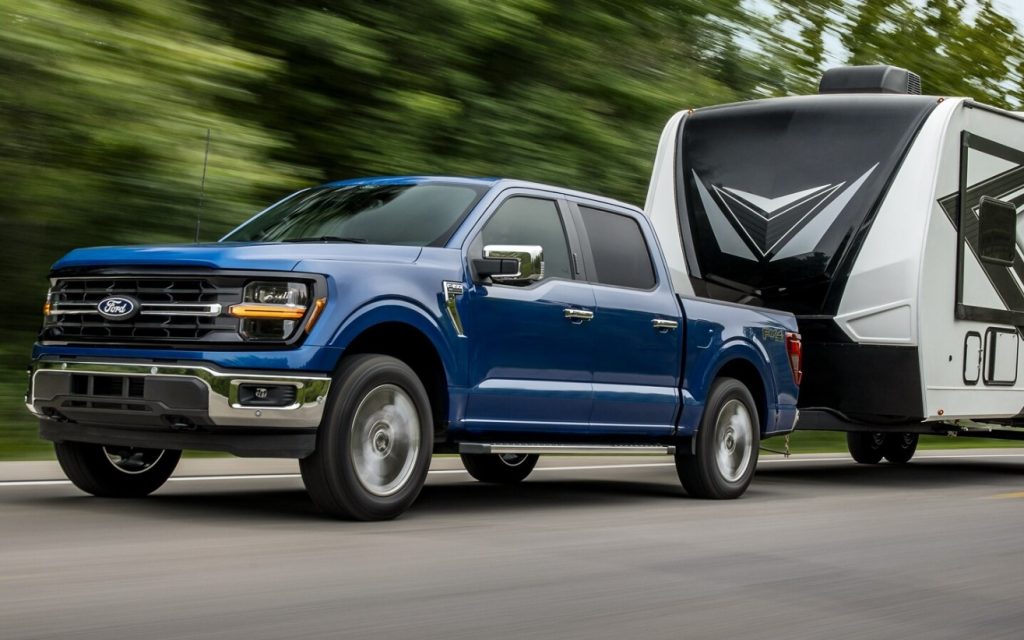 A new Ford F-150 pulls a trailer on the open road, making this the perfect road trip truck for you this holiday season. Shop for your new Ford truck near Chattanooga at Cleveland Ford today.