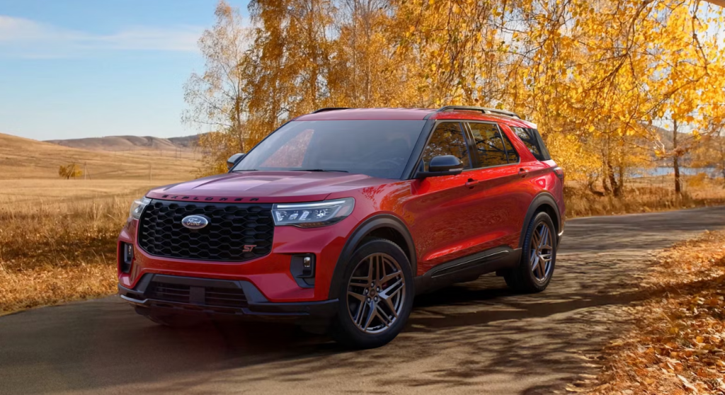 The 2026 Ford Explorer sits parked on a backroad with fall trees in the background. Shop for your new 2026 Ford Explorer at Ford of Spartanburg today.
